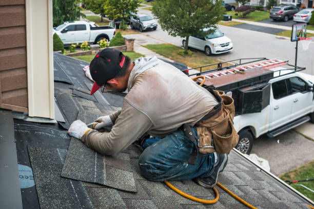 Professional Roofing technician working in Battery Park, VA